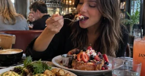 Montreal brunch spread with pancakes, eggs, coffee, pastries and breakfast dishes
